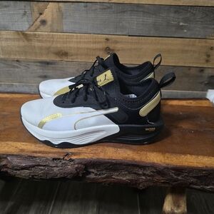 Puma Black and Gold Nitro Infused Sneakers